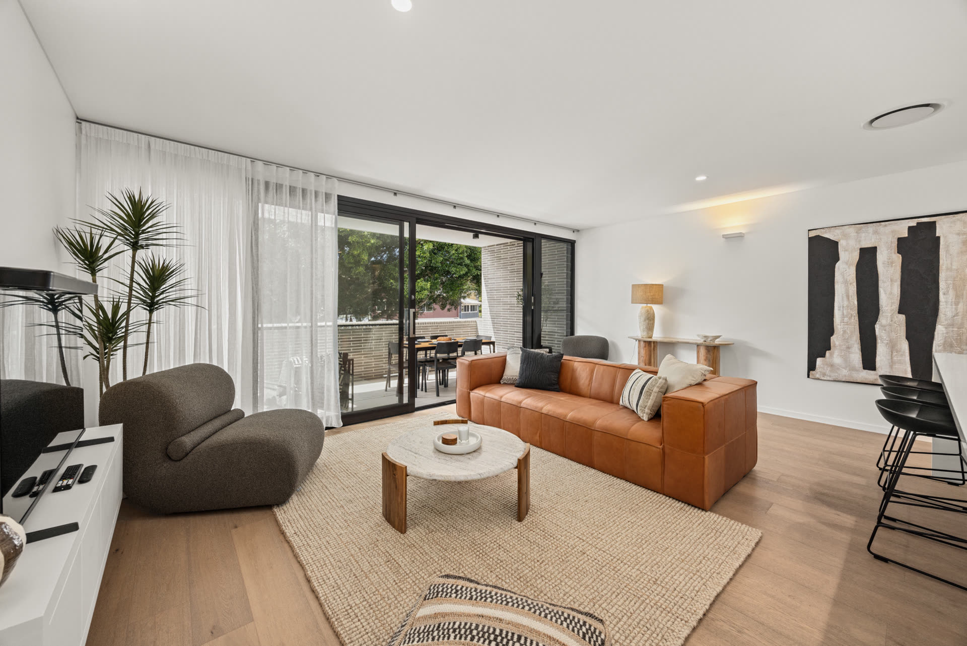 Open-plan living room opening onto the terrace